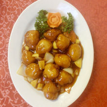 Picture of Breaded chicken cubes in sweet and sour sauce